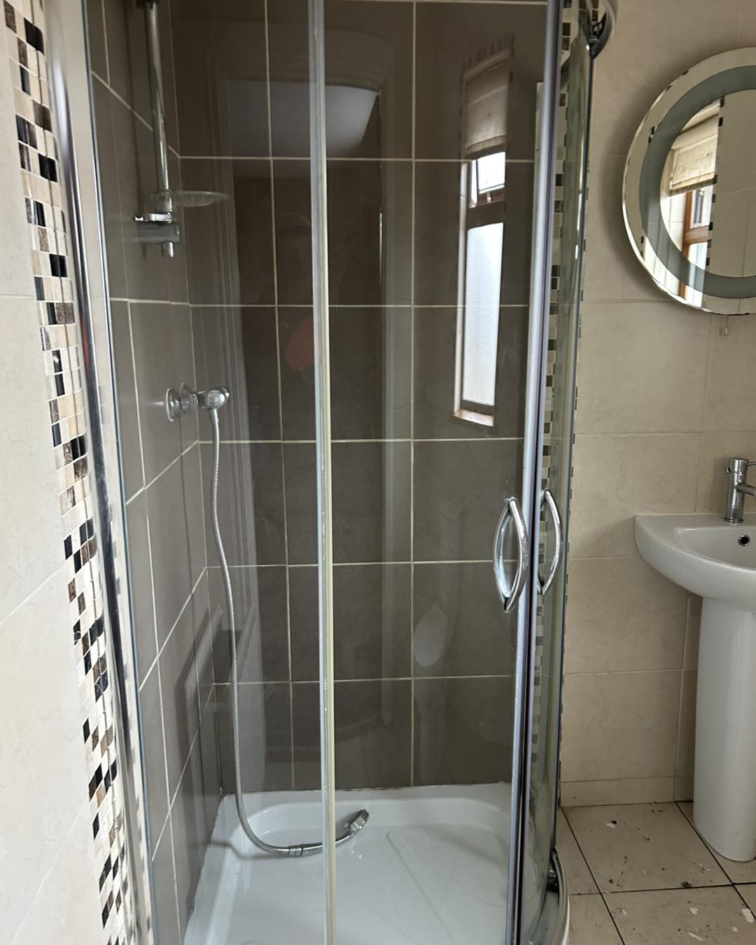 cleaned shower no longer dirty by Neil's Cleaning