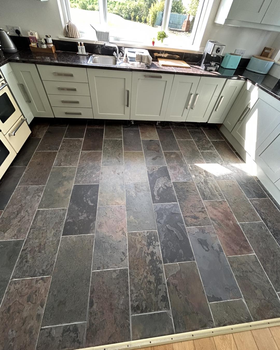 kitchen tile hard floor showcases colours and difference after deep clean